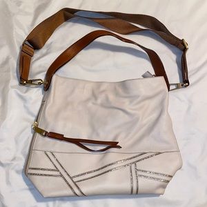 Snow white fossil Maya hobo bag with secret side pocket and convertible straps.